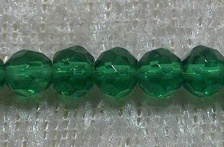 Facetterad rund kristallpärla, Mörkgrön, 4 mm