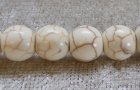 Syntetisk turkos, rund, offwhite, 6 mm