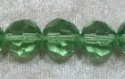 Facetterad rund kristallpärla, Ljusgrön, 12 mm