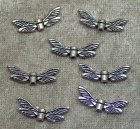 Sländevingar, antiksilver