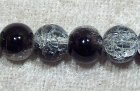 Krackelerad glaspärla, 4 mm, svart/transparent