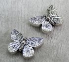 Mellandel, fjäril, antiksilver