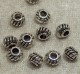 Mellandel, bullig kruka, vridet mönster, antiksilver Mellandel, bullig kruka, vridet mönster, antiksilver