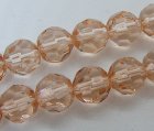 Facetterad rund glaspärla, Laxrosa, 8 mm