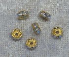 Strassmellandel, rondell, transparent/guldfärgad, 5 mm