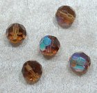 Facetterad rund kristallpärla, Brun AB, 12 mm