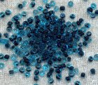 Turkos/Svartlined Rocaille, 1,9x2 mm
