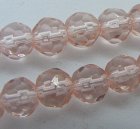 Facetterad rund glaspärla, Ljust laxrosa, 6 mm