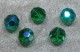 Facetterad rund kristallpärla, Grön AB, 12 mm