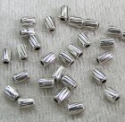 Mellandel, räfflad cylinder, silverfärgad