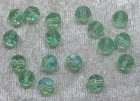 Facetterad rund kristallpärla, Ljusgrön AB, 6 mm