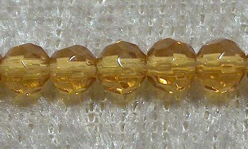 Facetterad rund kristallpärla, Bärnsten, 4 mm