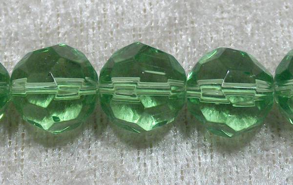 Facetterad rund kristallpärla, Ljusgrön, 12 mm - Klicka på bilden för att stänga
