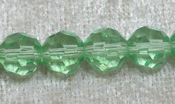 Facetterad rund kristallpärla, Ljusgrön, 8 mm - Klicka på bilden för att stänga