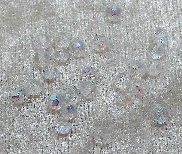 Facetterad rund kristallpärla, Transparent AB, 4 mm - Klicka på bilden för att stänga