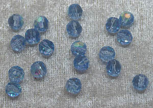 Facetterad rund kristallpärla, Ljusblå AB, 6 mm - Klicka på bilden för att stänga