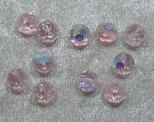 Facetterad rund kristallpärla, Ljusrosa AB, 8 mm